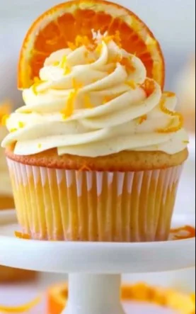Cupcakes de Naranja decorados con crema y rodajas de naranja