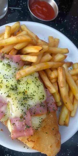 Delicious french fries with ham