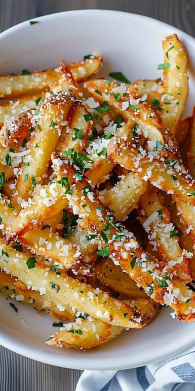 Papas fritas al ajo y parmesano en freidora de aire