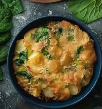 Plato de Papas y Espinacas bien presentado y colorido